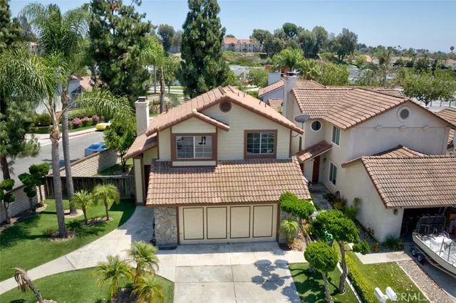 a aerial view of a house with a garden