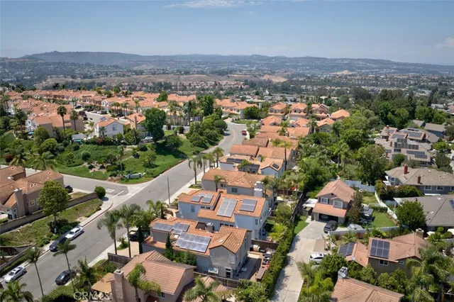 an aerial view of a city with lots of residential buildings