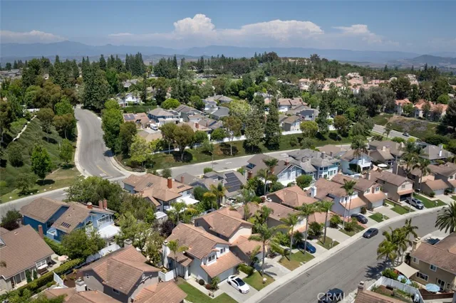 an aerial view of a city with lots of residential buildings