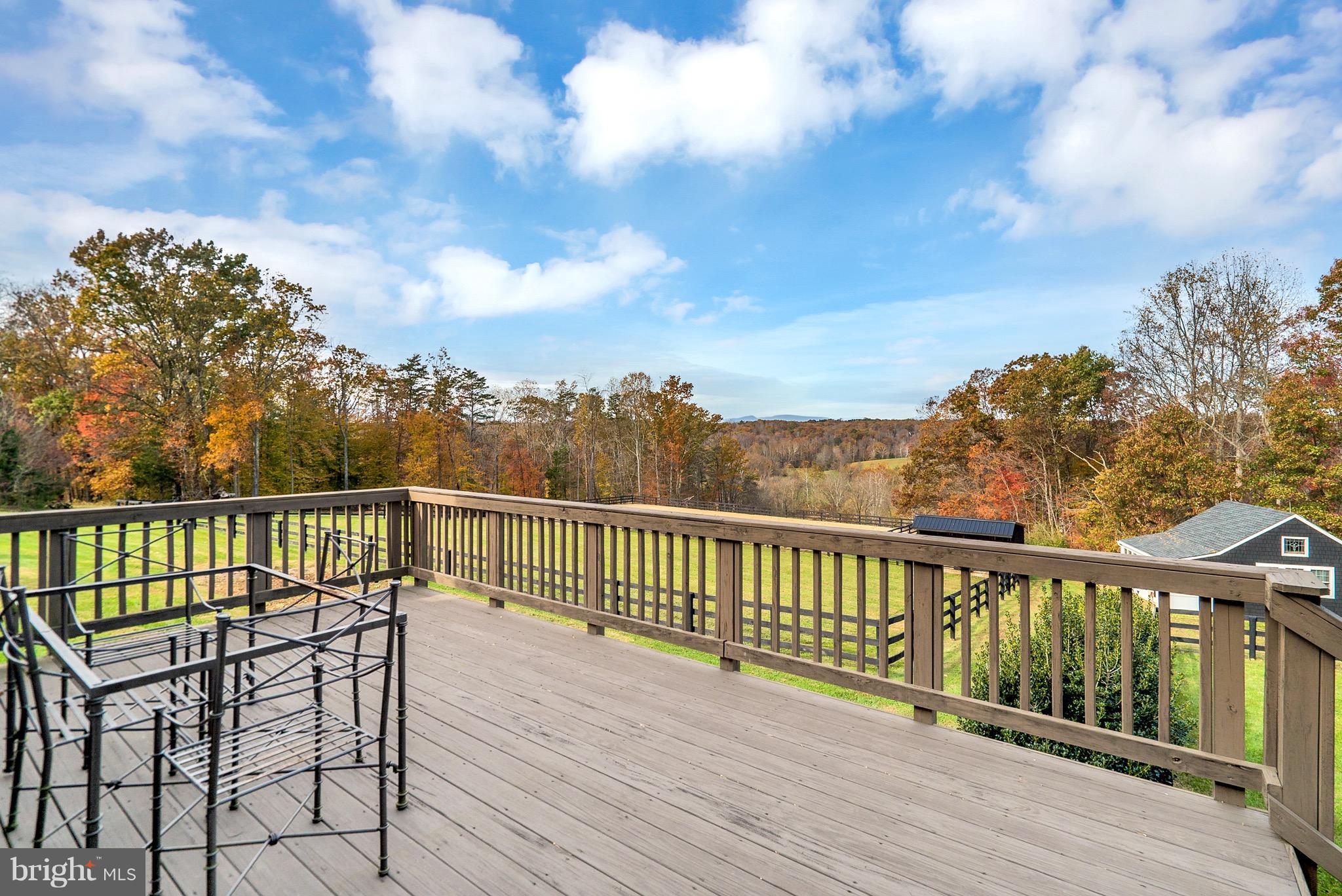 9692 Ridge View Drive Marshall, VA 20115 - Photo 16 of 26 a view of balcony with wooden floor and fence