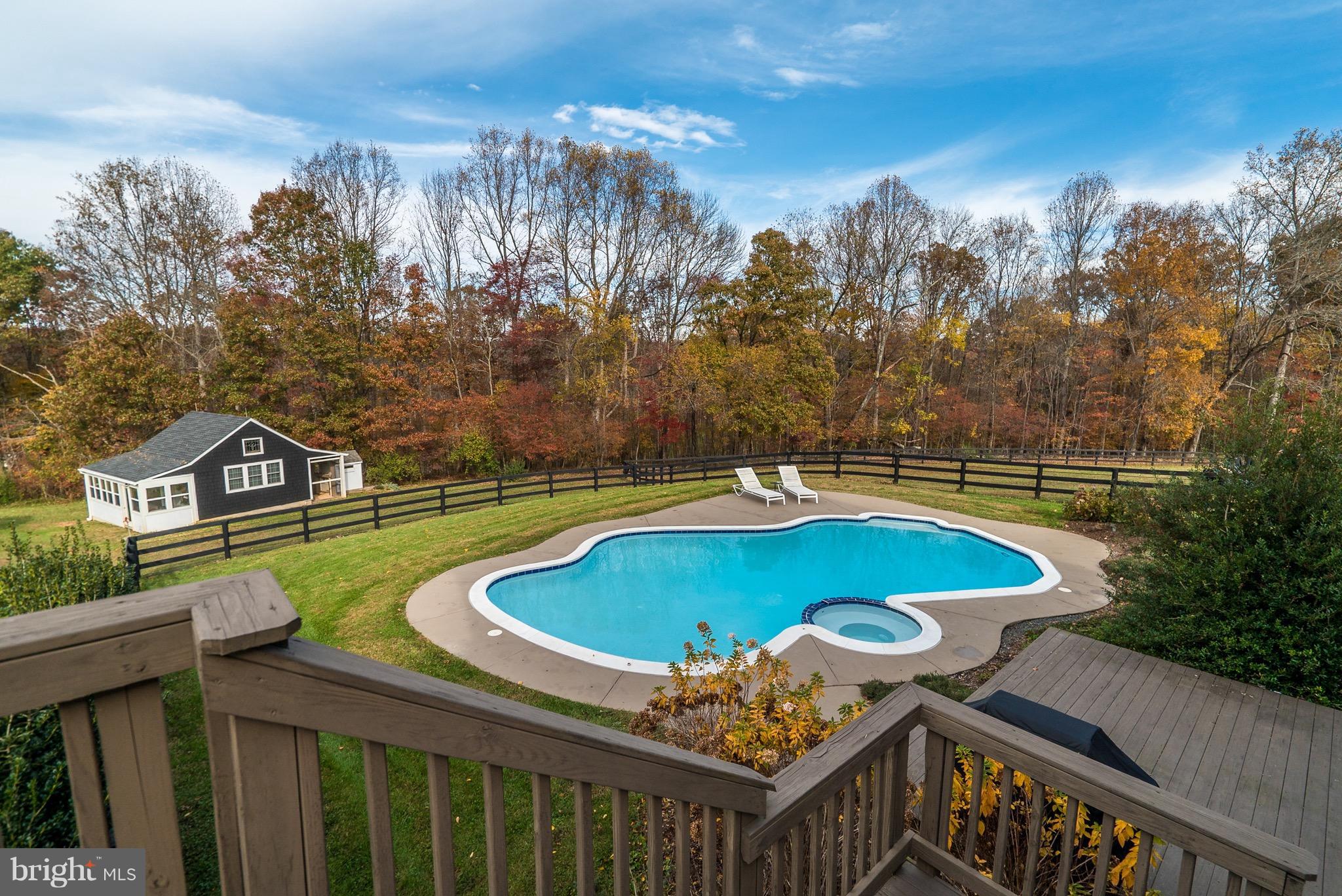 9692 Ridge View Drive Marshall, VA 20115 - Photo 17 of 26 a view of a swimming pool with a patio