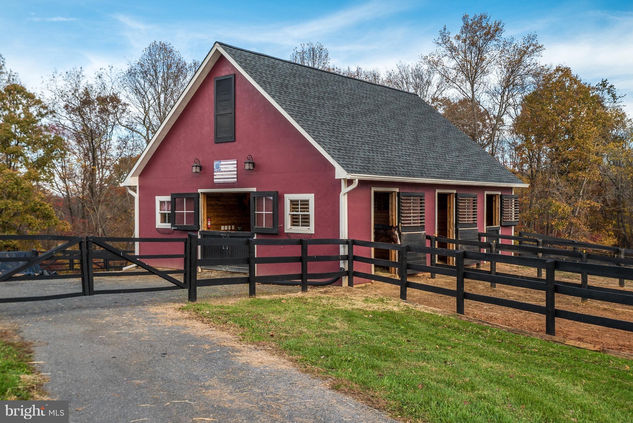 9692 Ridge View Drive Marshall, VA 20115 - Photo 18 of 26 a front view of a house with a yard