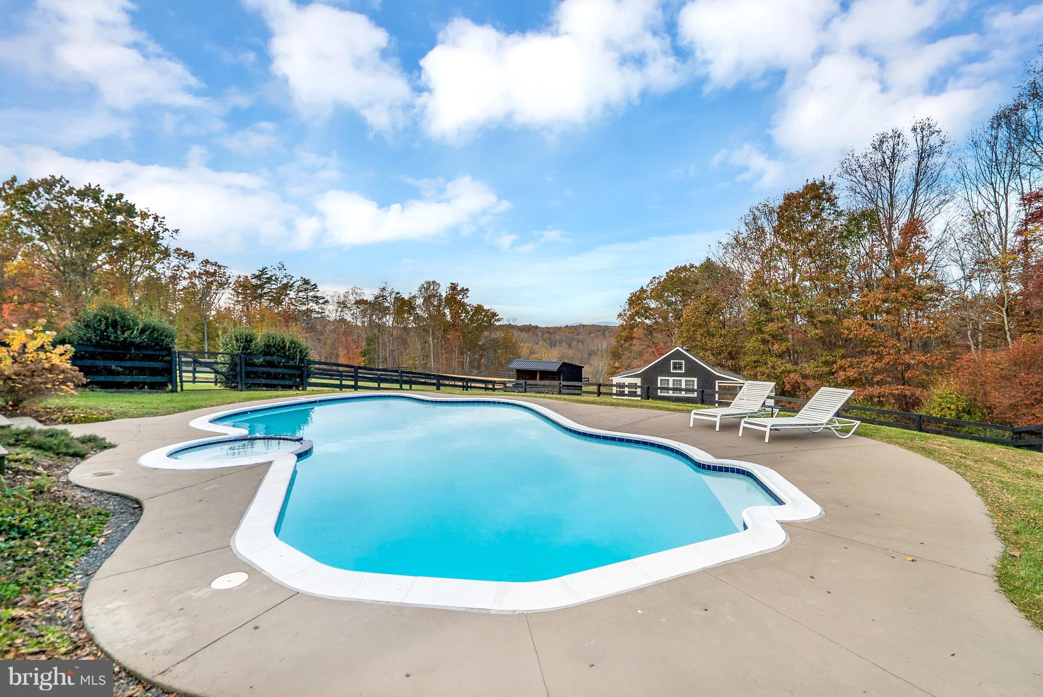 9692 Ridge View Drive Marshall, VA 20115 - Photo 22 of 26 a view of a swimming pool with a yard