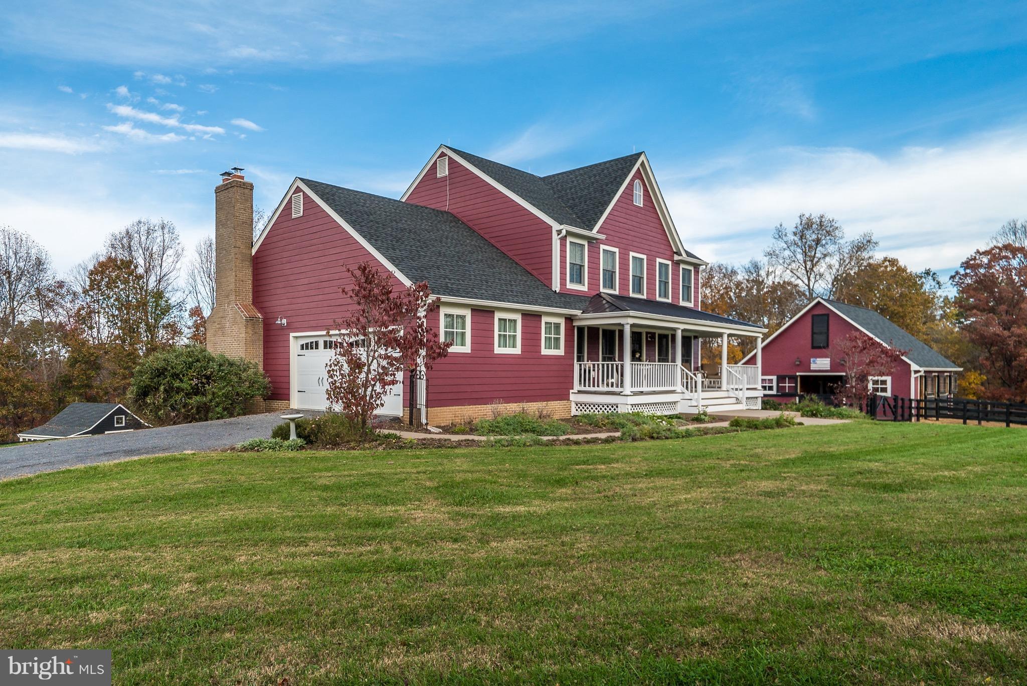 9692 Ridge View Drive Marshall, VA 20115 - Photo 26 of 26 a front view of a house with a garden