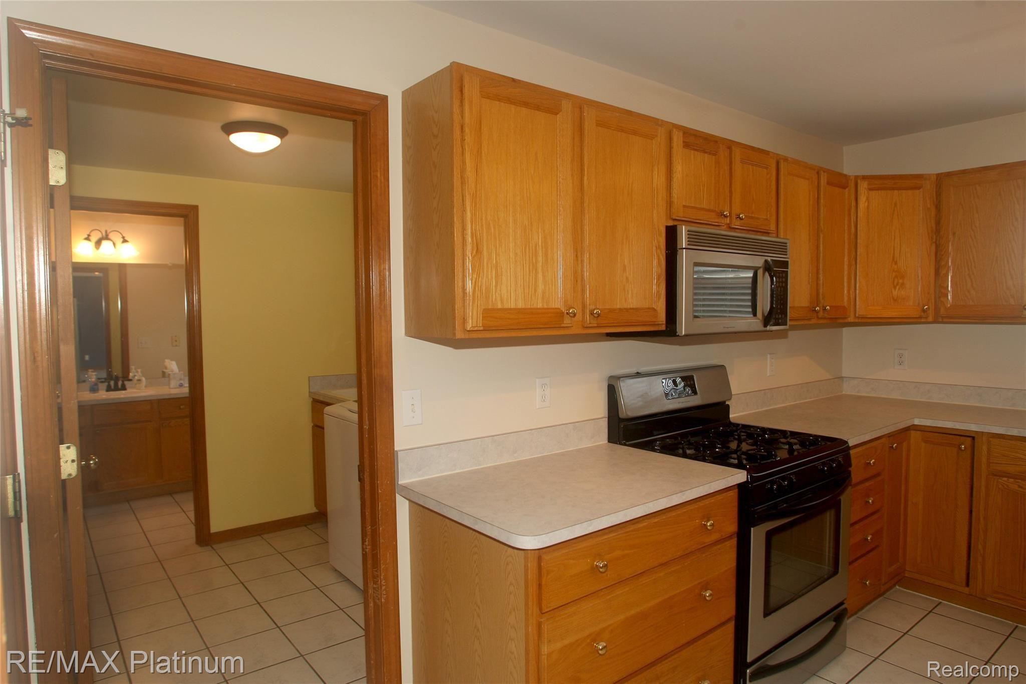 1756 Argentine Road Howell, MI 48843 - Photo 16 of 46 kitchenlaundry Rm1.jpg