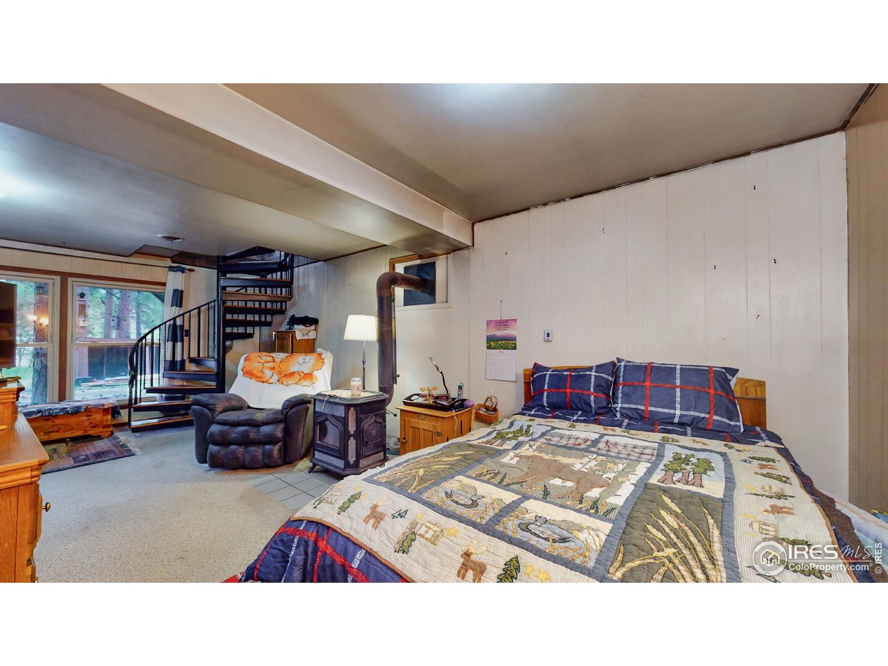 1292 Kiowa Road Lyons, CO 80540 - Photo 23 of 35 Lower Level Family Room or Bedroom 3