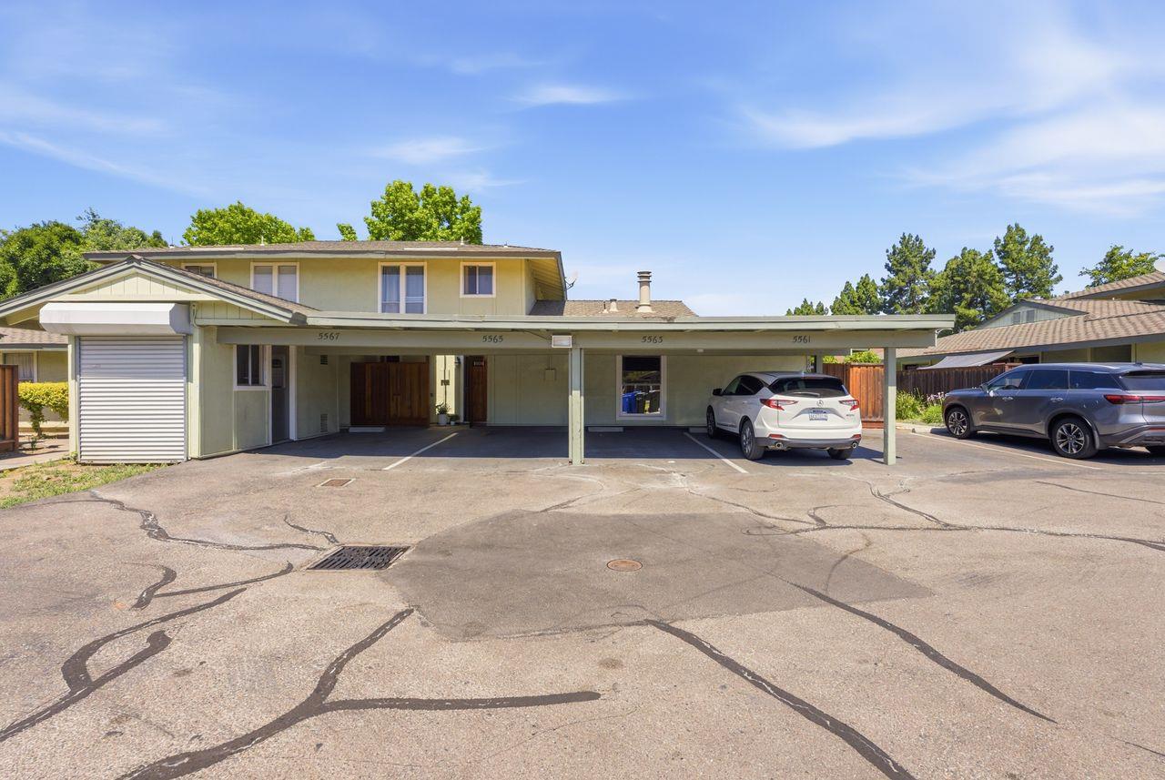 5561 Roundtree Common Fremont, CA 94538 - Photo 19 of 29 a car parked in front of a building