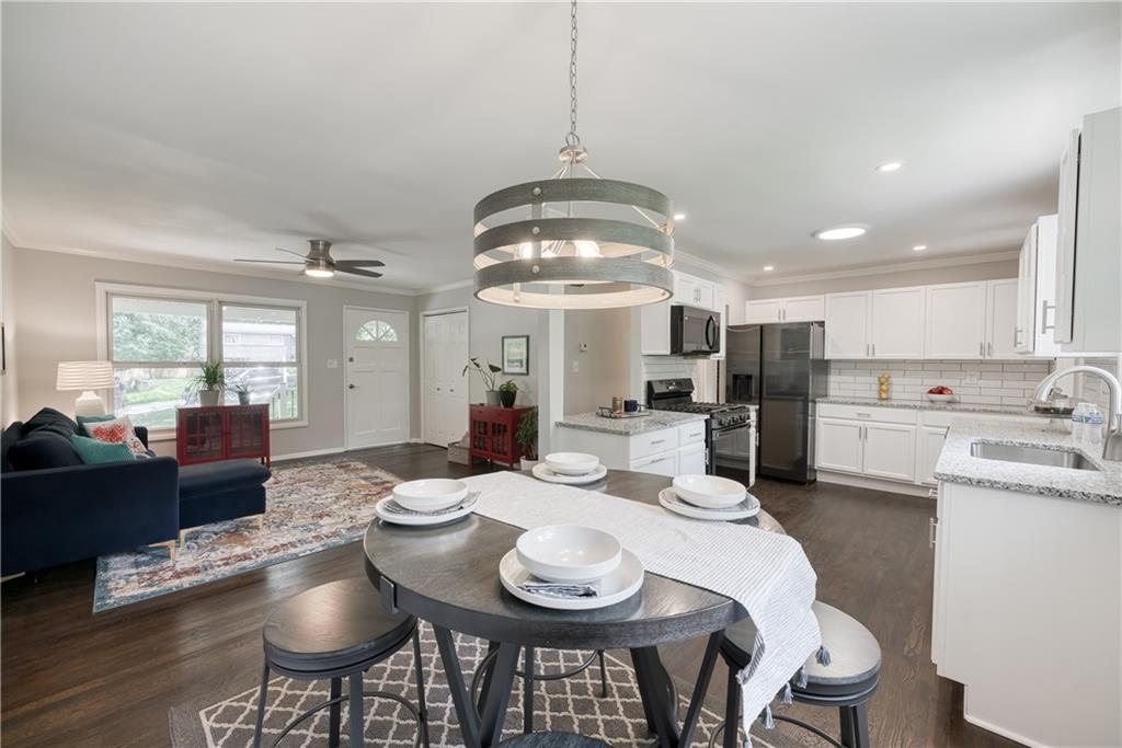3093 Dove Way Decatur, GA 30033 - Photo 1 of 1 a view of a dining room with furniture and wooden floor