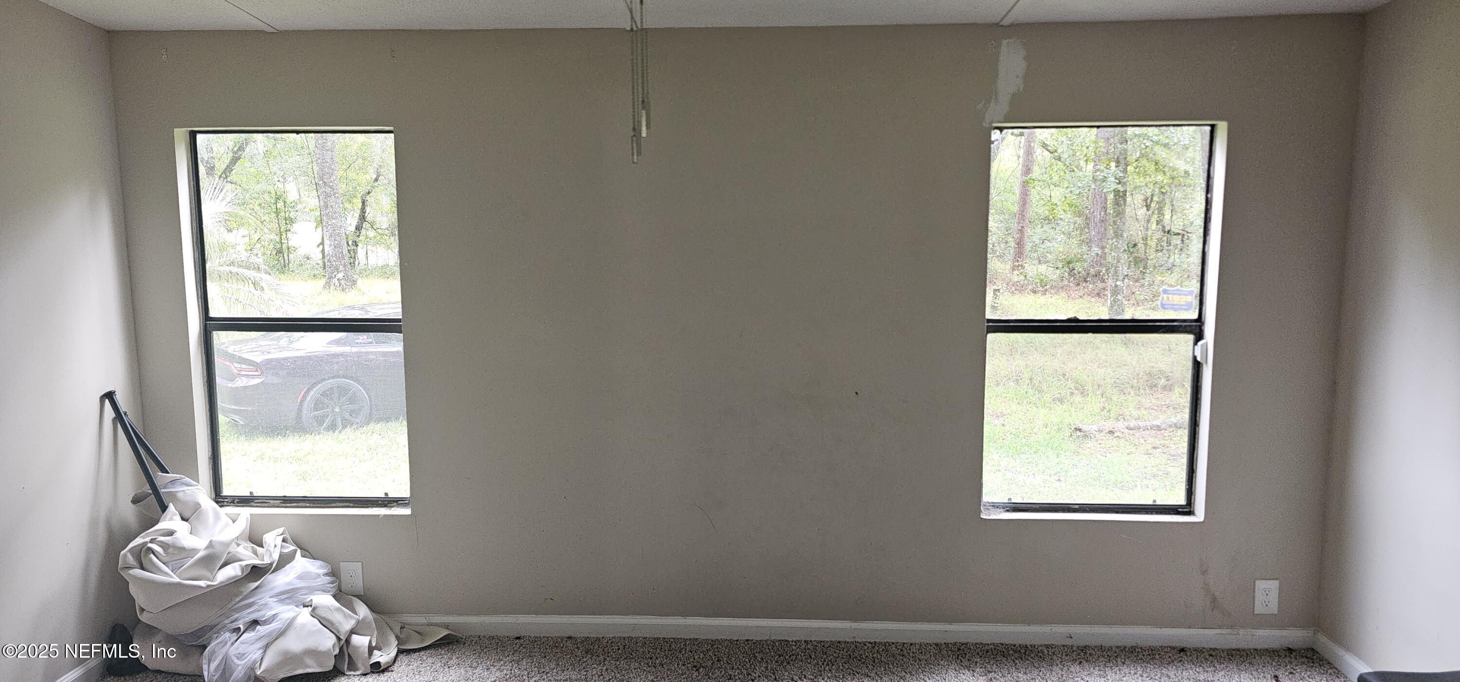 5951 Westwood Road North Jacksonville, FL 32234 - Photo 21 of 33 a room with a window and bed