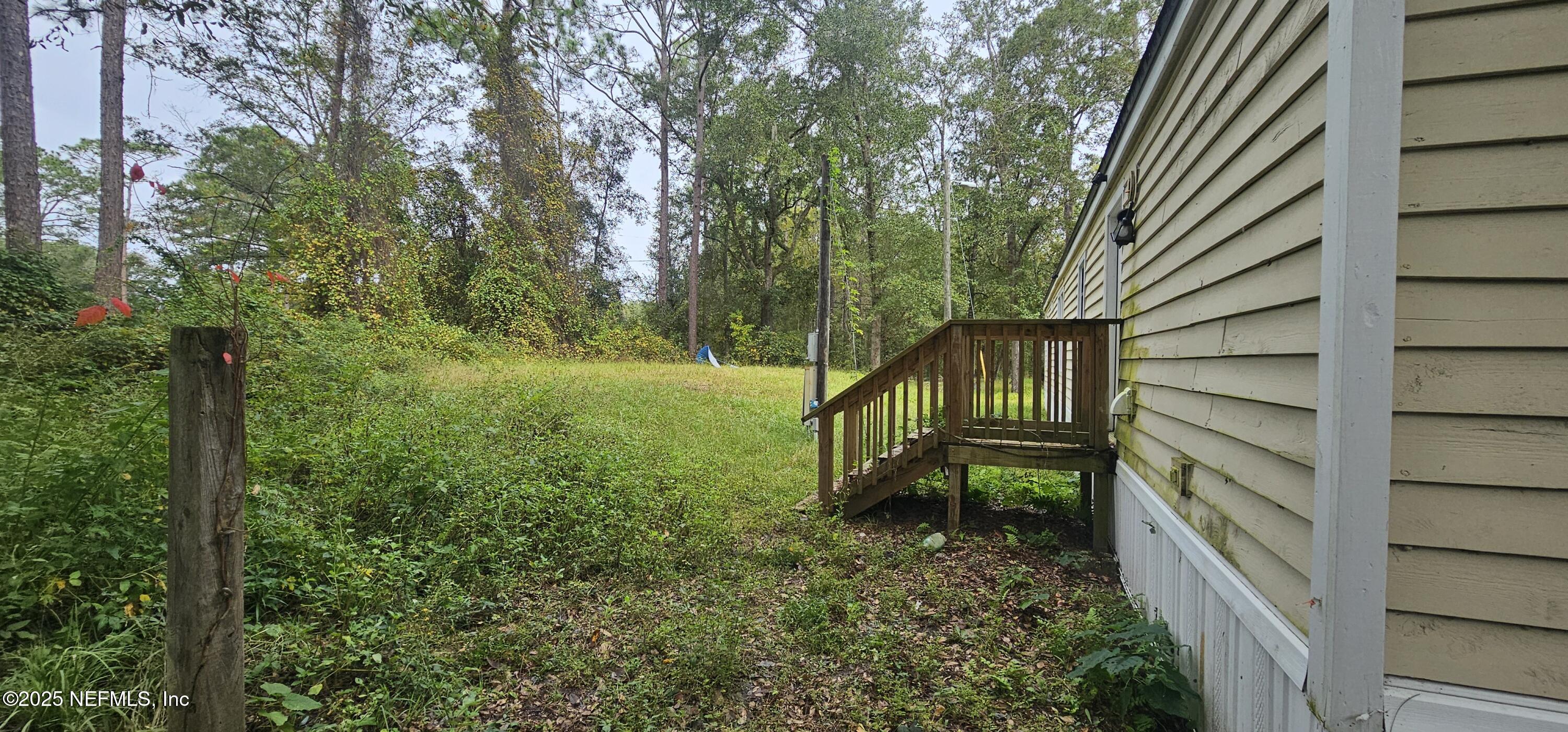 5951 Westwood Road North Jacksonville, FL 32234 - Photo 4 of 33 a view of a yard in front of house