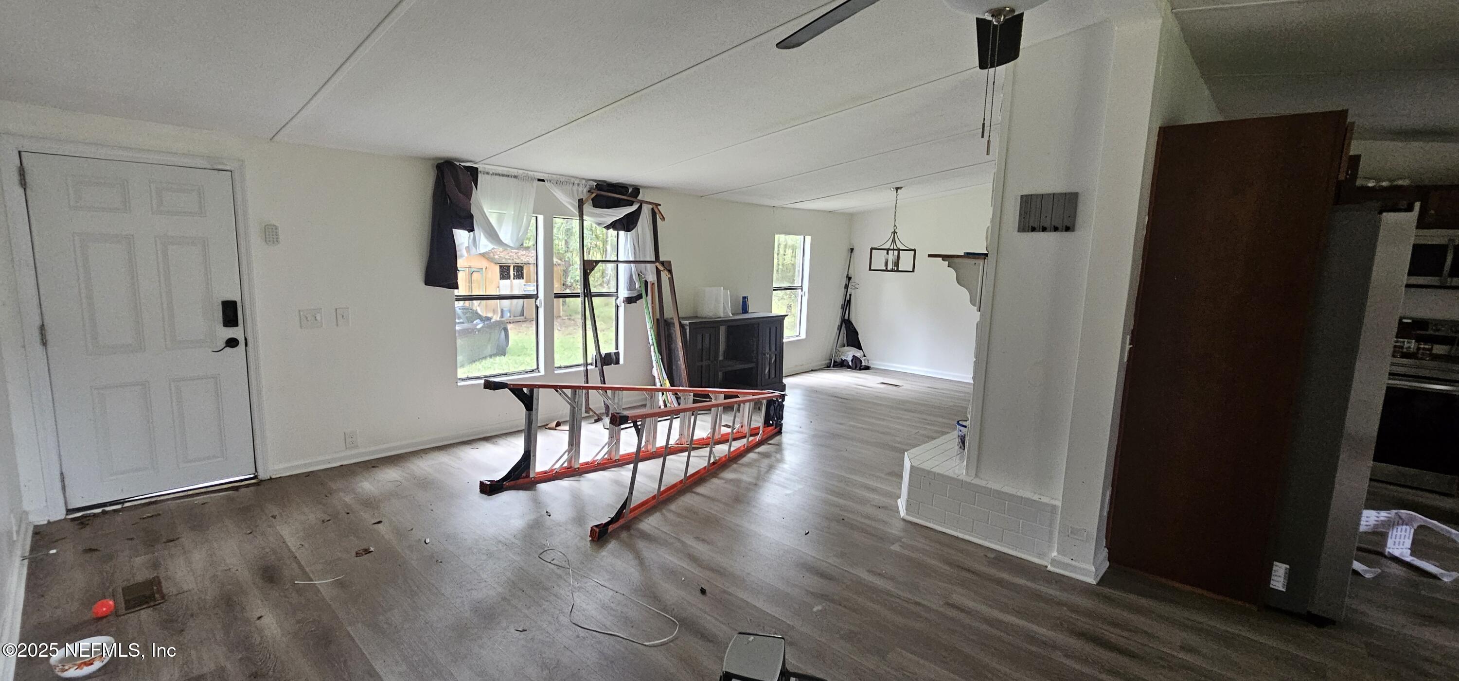 5951 Westwood Road North Jacksonville, FL 32234 - Photo 5 of 33 a living room with furniture and a window