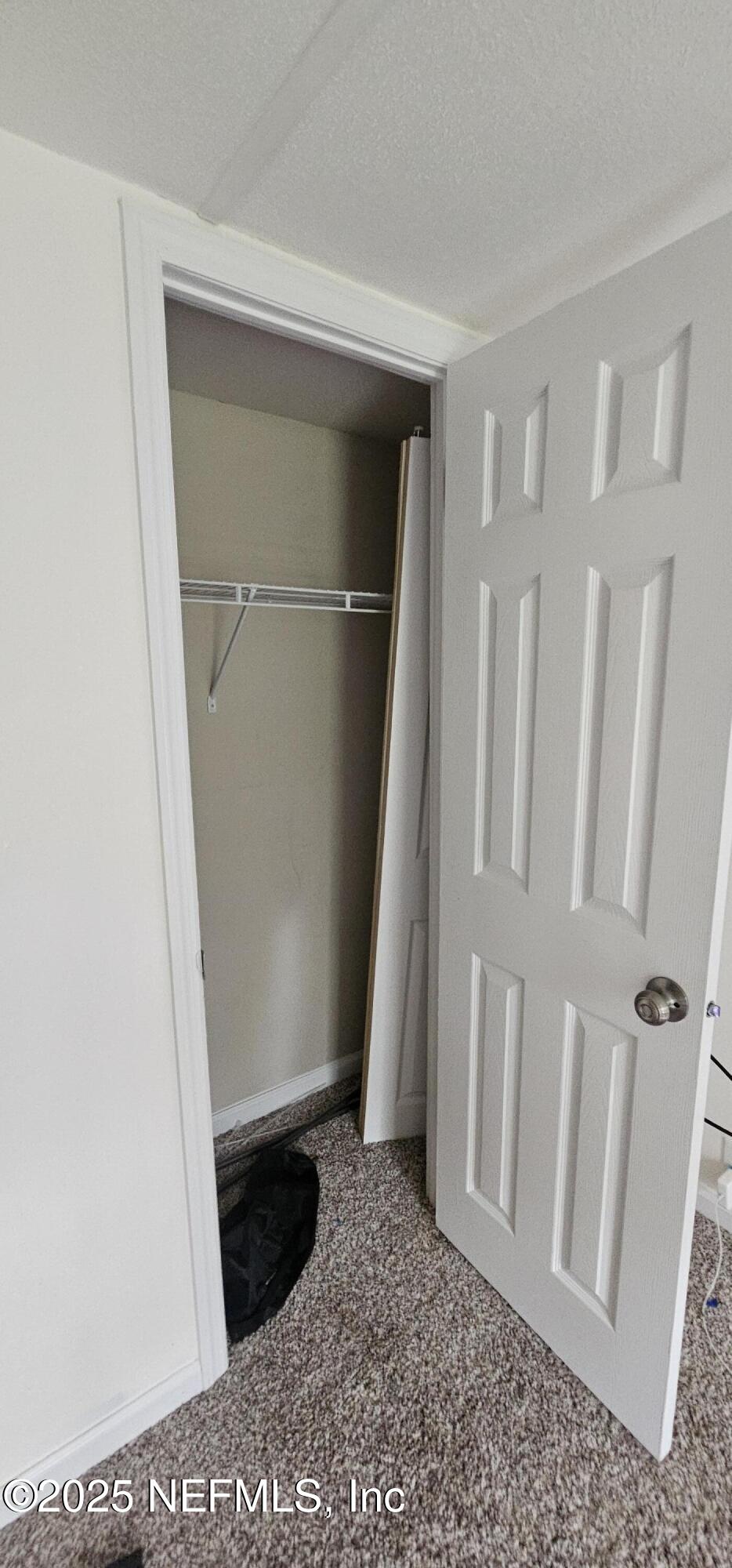 5951 Westwood Road North Jacksonville, FL 32234 - Photo 8 of 33 a view of entryway with wooden floor