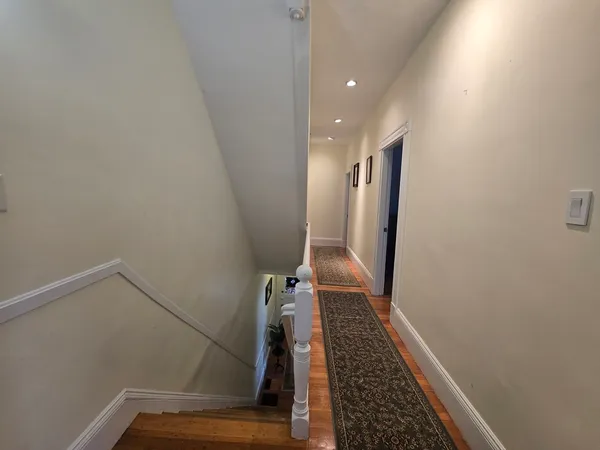 a view of hallway with stairs