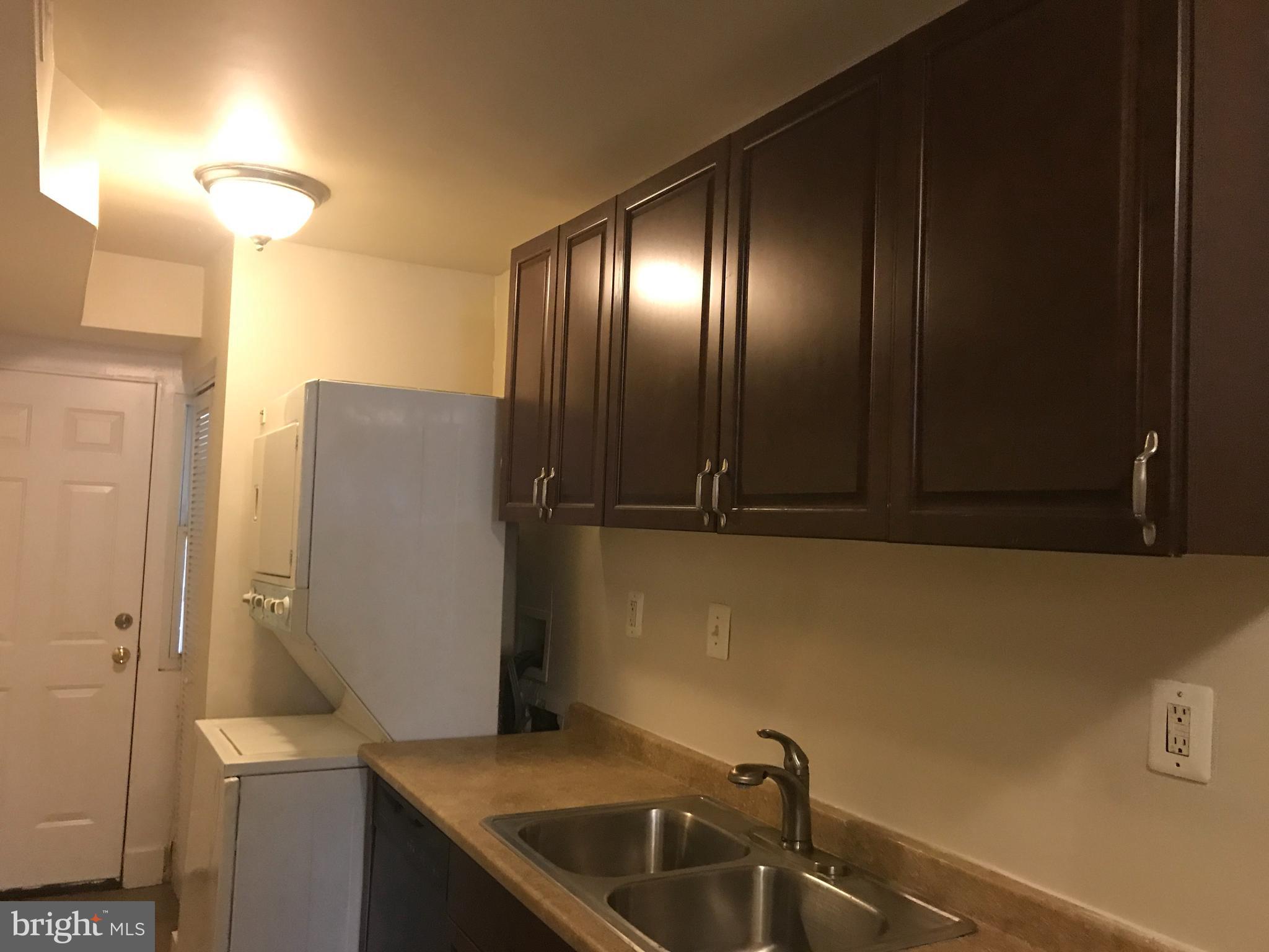 1918 I Street Northeast Washington, DC 20002 - Photo 11 of 29 a bathroom with a sink and mirror