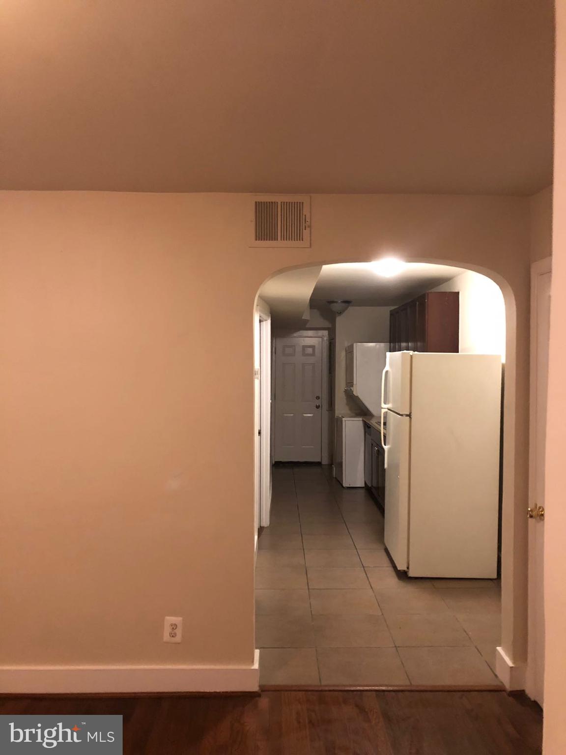 1918 I Street Northeast Washington, DC 20002 - Photo 13 of 29 a view of a storage & utility room with a washer dryer