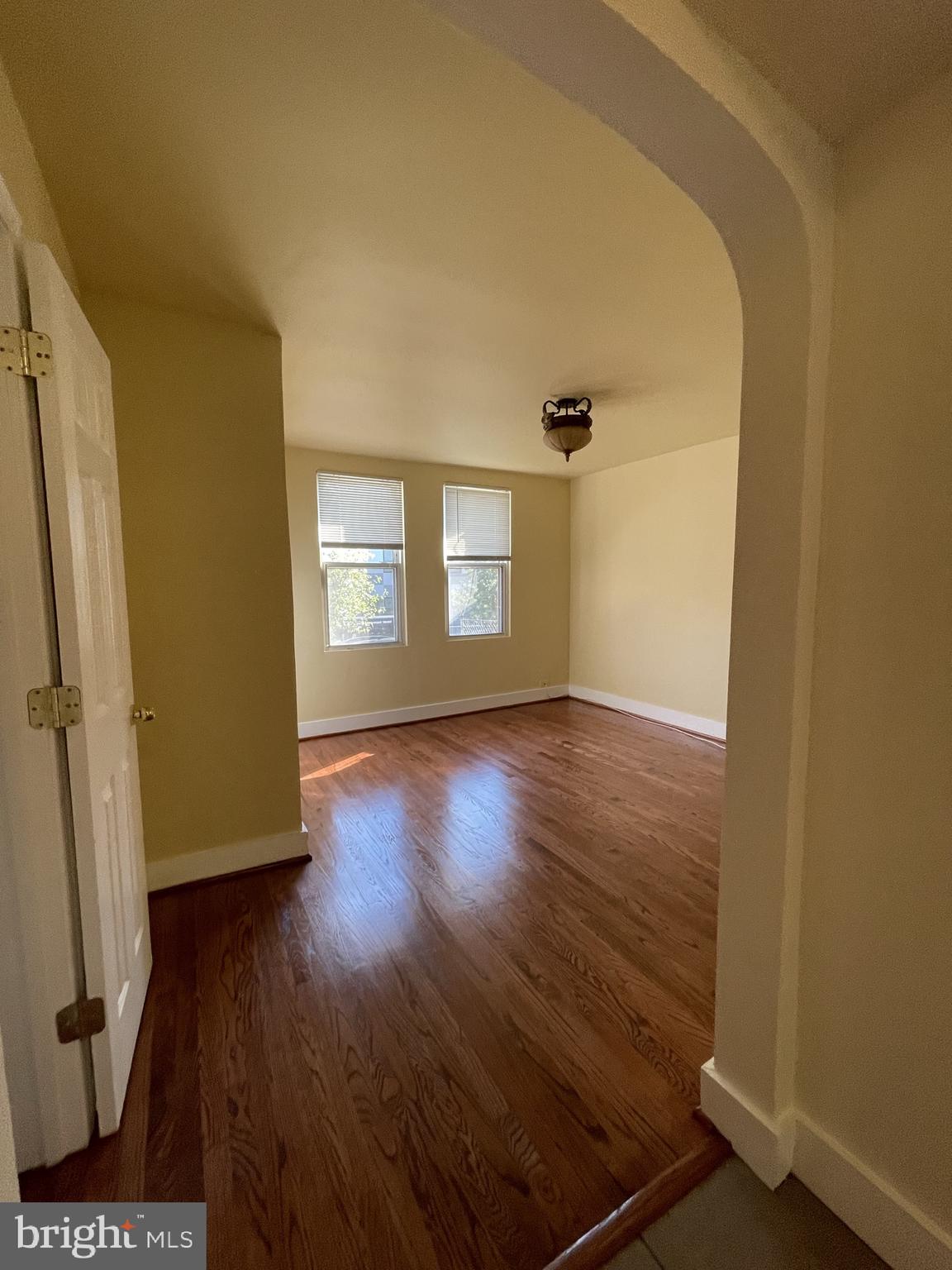 1918 I Street Northeast Washington, DC 20002 - Photo 25 of 29 a view of livingroom with hardwood floor and window