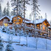 a view of house with a yard