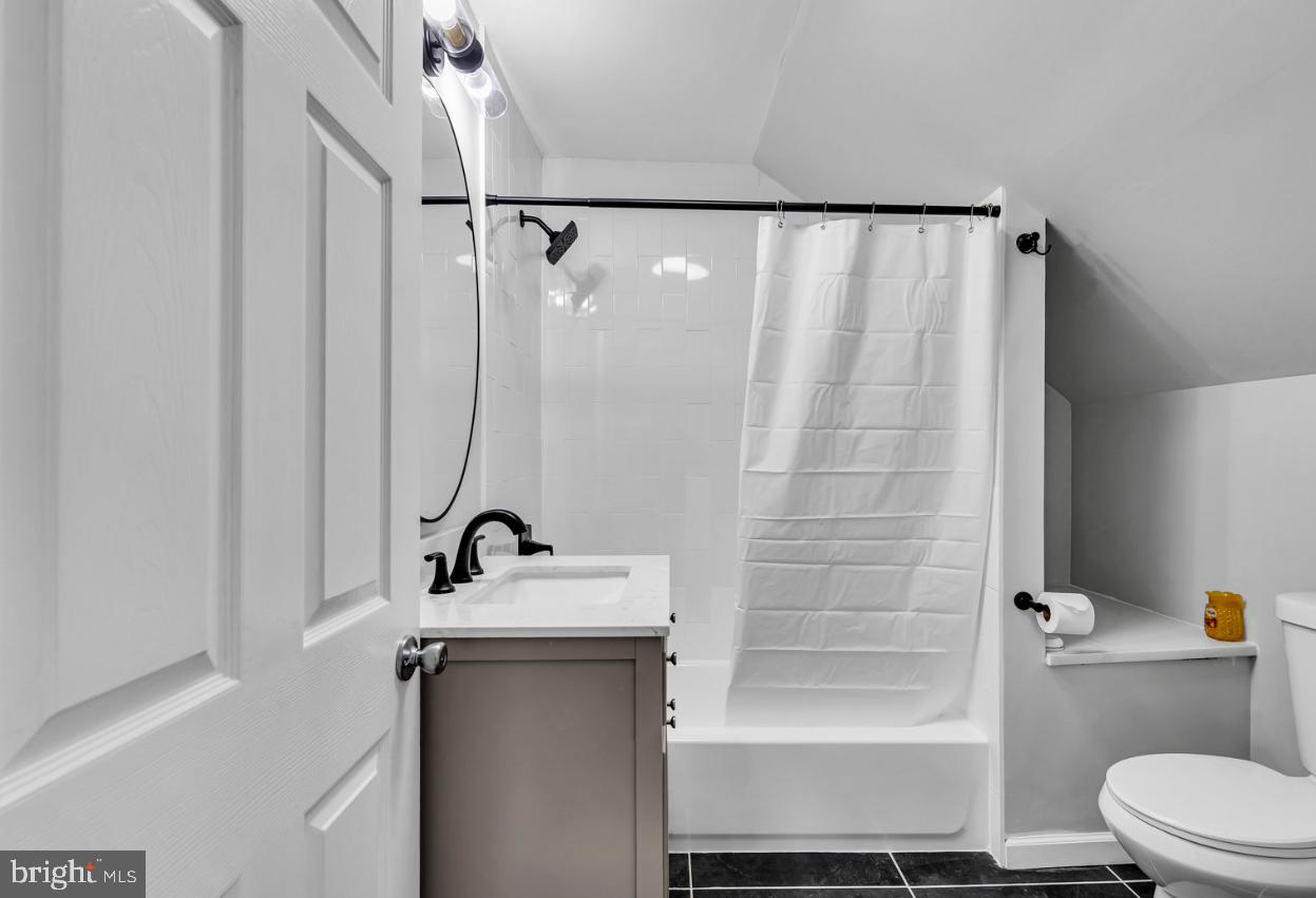 239 West Evesham Road Runnemede, NJ 08078 - Photo 25 of 31 a bathroom with a sink a toilet and shower