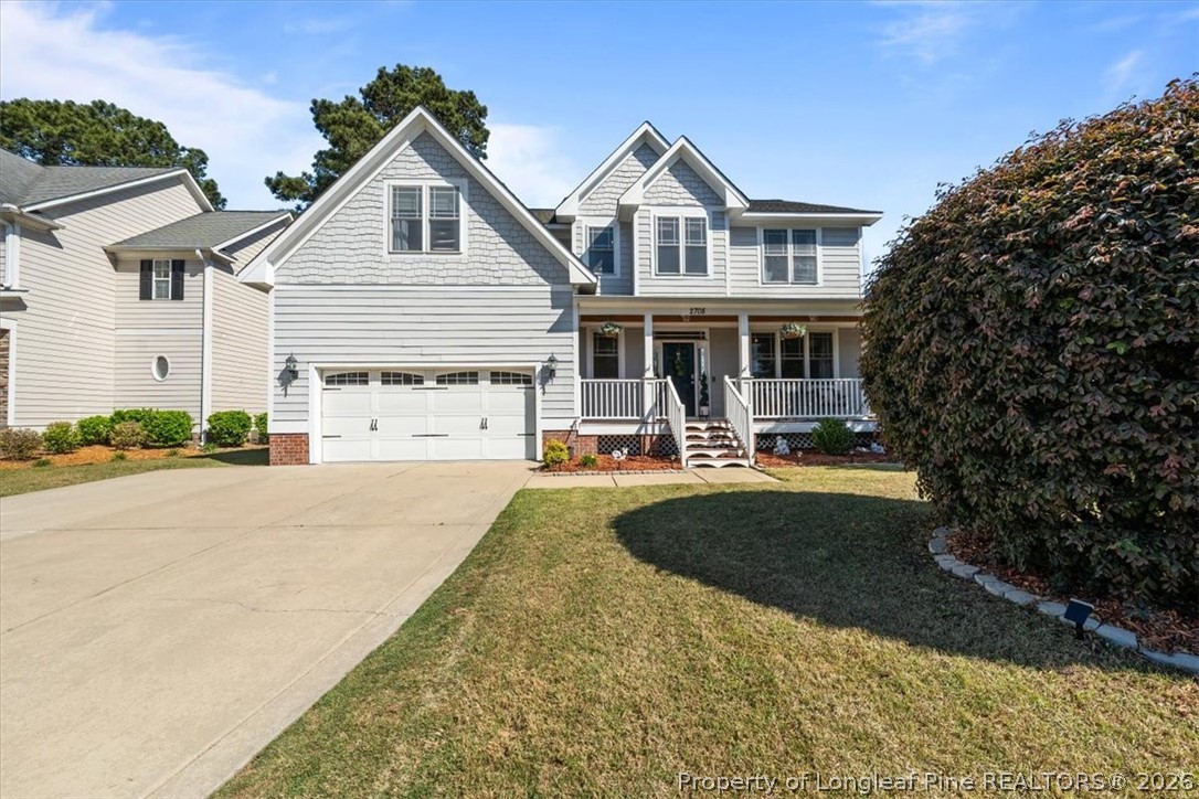 2708 Plum Ridge Road Fayetteville, NC 28306 - Photo 1 of 27 a front view of a house with garden