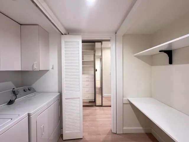 a utility room with dryer and washer