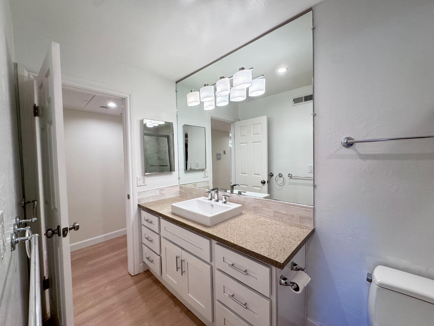 101 2nd Street, Unit 5 Los Altos, CA 94022 - Photo 2 of 48 a bathroom with a sink and a mirror
