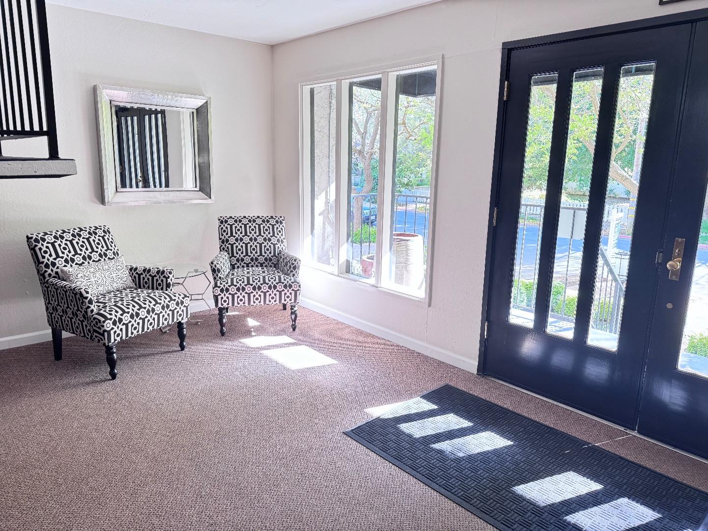 101 2nd Street, Unit 5 Los Altos, CA 94022 - Photo 26 of 48 a living room with furniture and a window