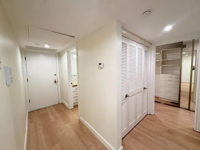 a view of a livingroom with wooden floor