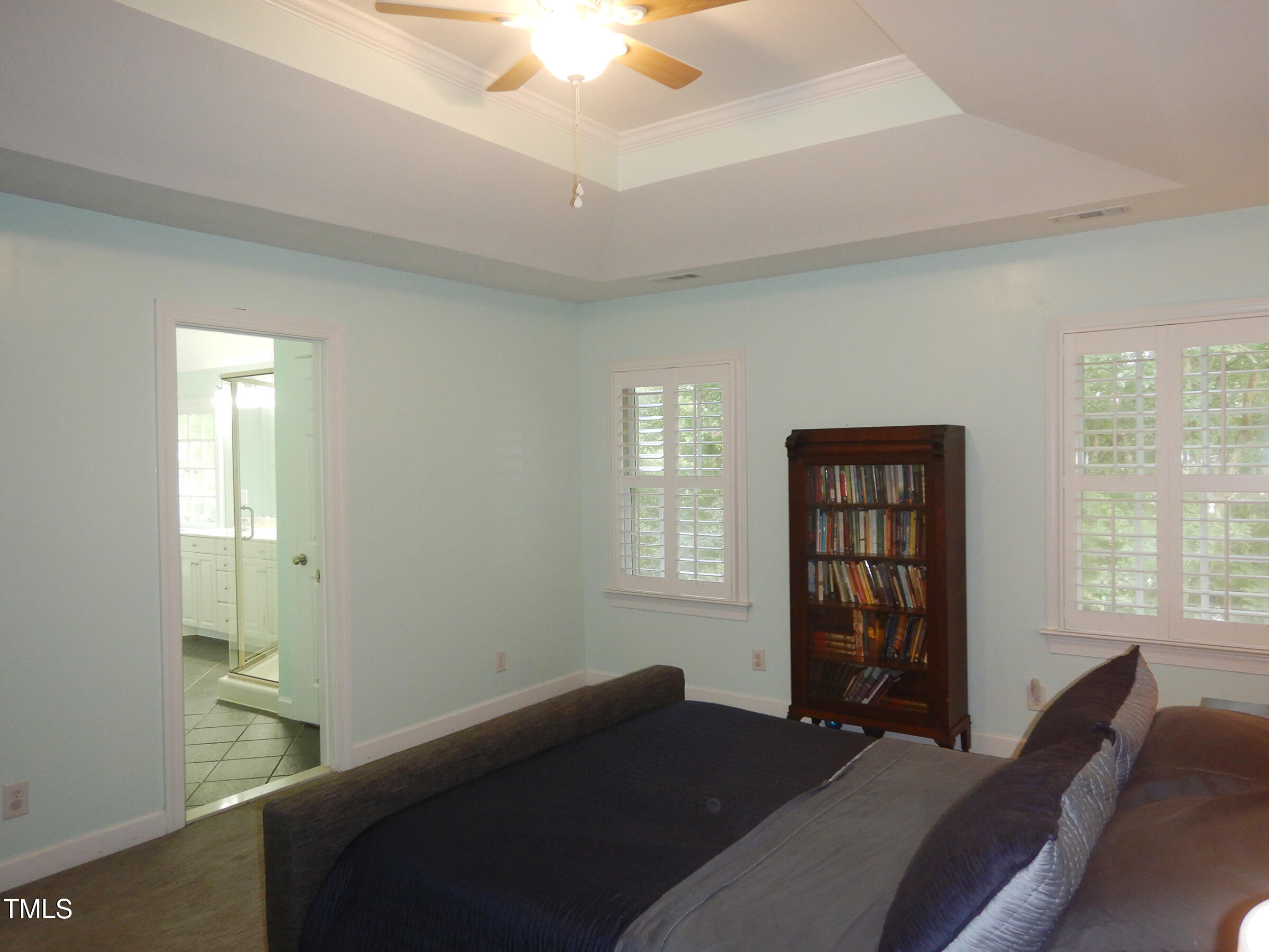 3100 Anderson Drive Raleigh, NC 27609 - Photo 18 of 31 a bedroom with a bed and a window
