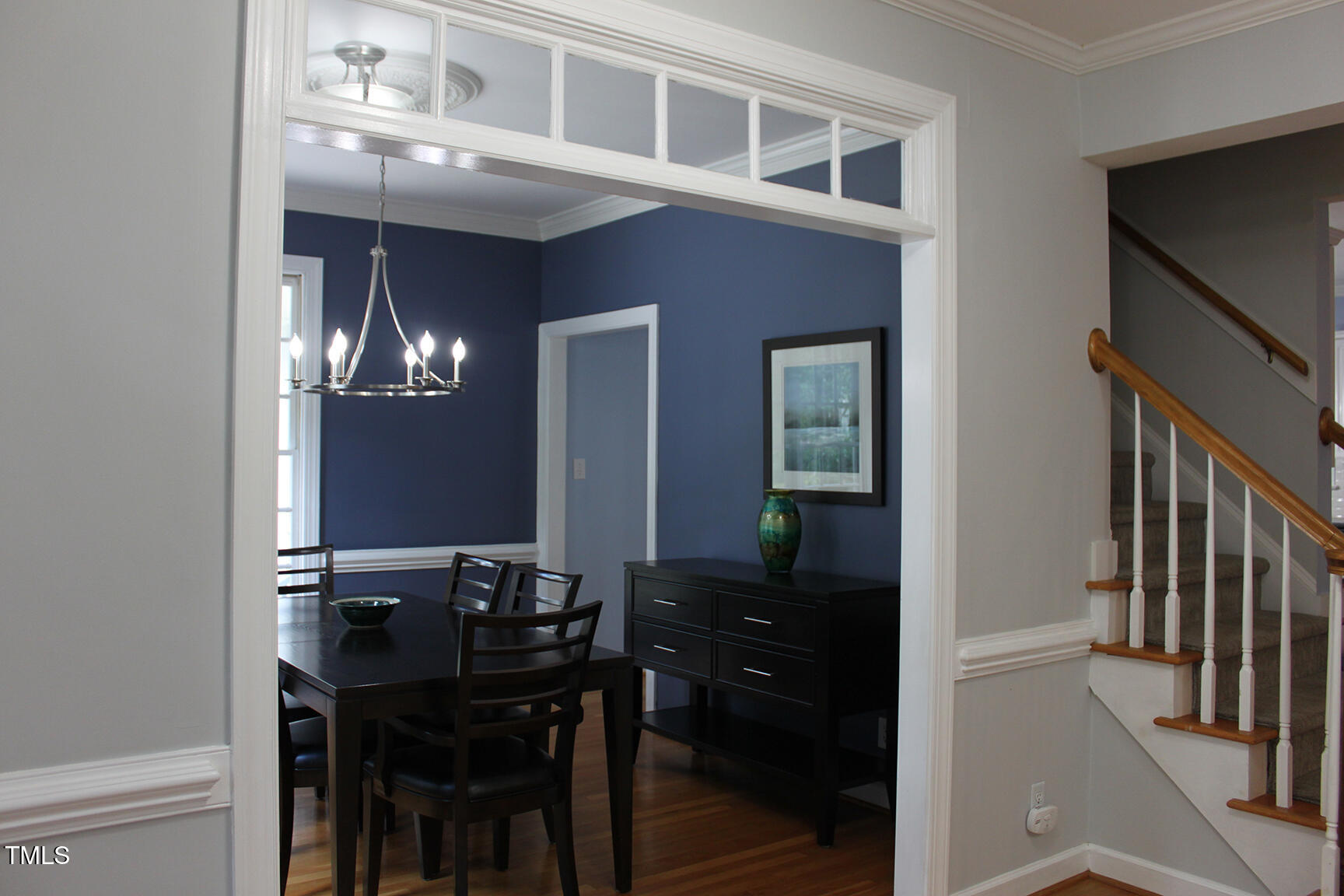 3100 Anderson Drive Raleigh, NC 27609 - Photo 7 of 31 a view of a dining room with furniture