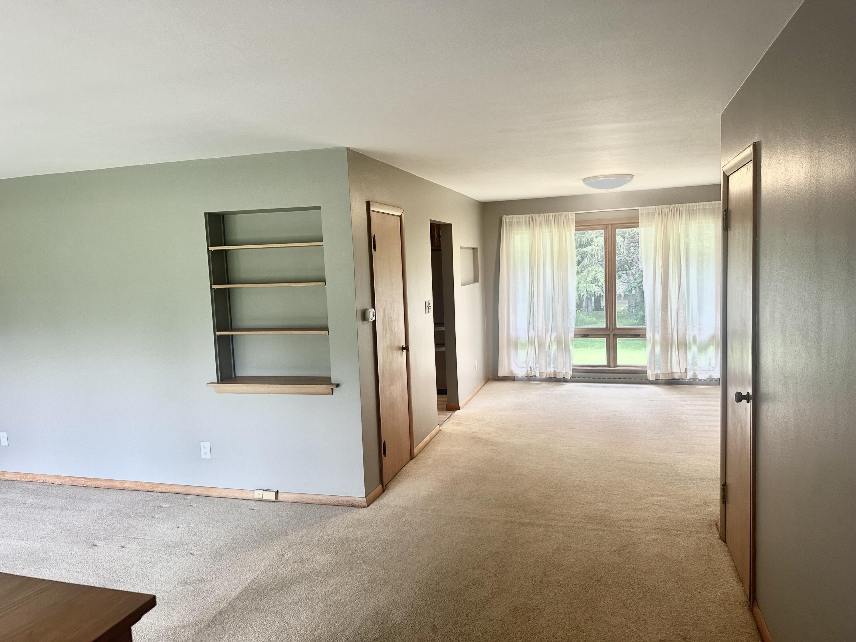 1303 Main Street Delafield, WI 53018 - Photo 13 of 13 Living room to Dining area