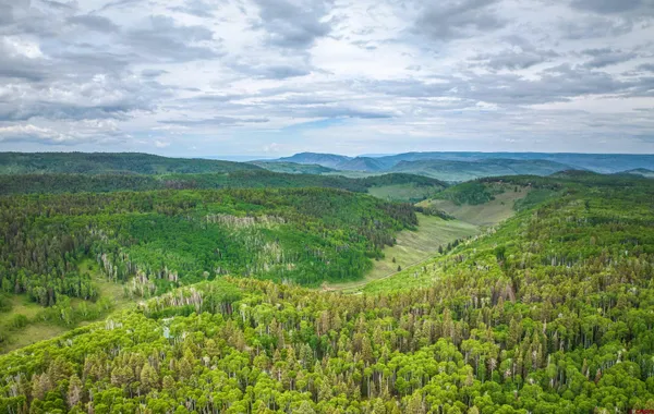 a view of lake with mountain in the back