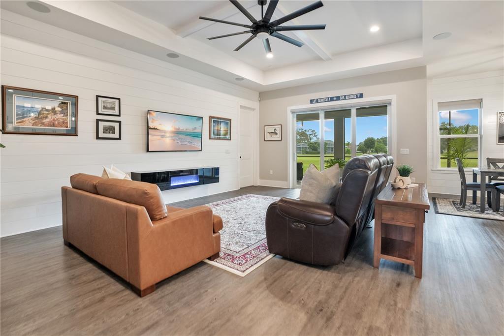 440 Palma Ceia Road Winter Haven, FL 33884 - Photo 20 of 78 a living room with furniture and a wooden floor
