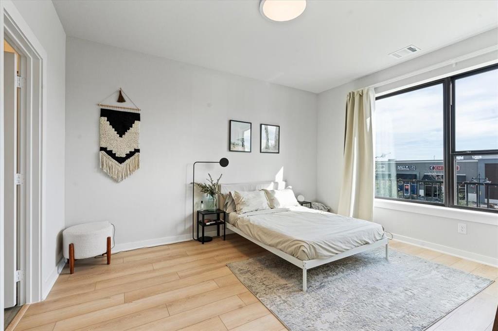 2268 Rook Drive Dallas, TX 75211 - Photo 6 of 19 a bedroom with a bed and window