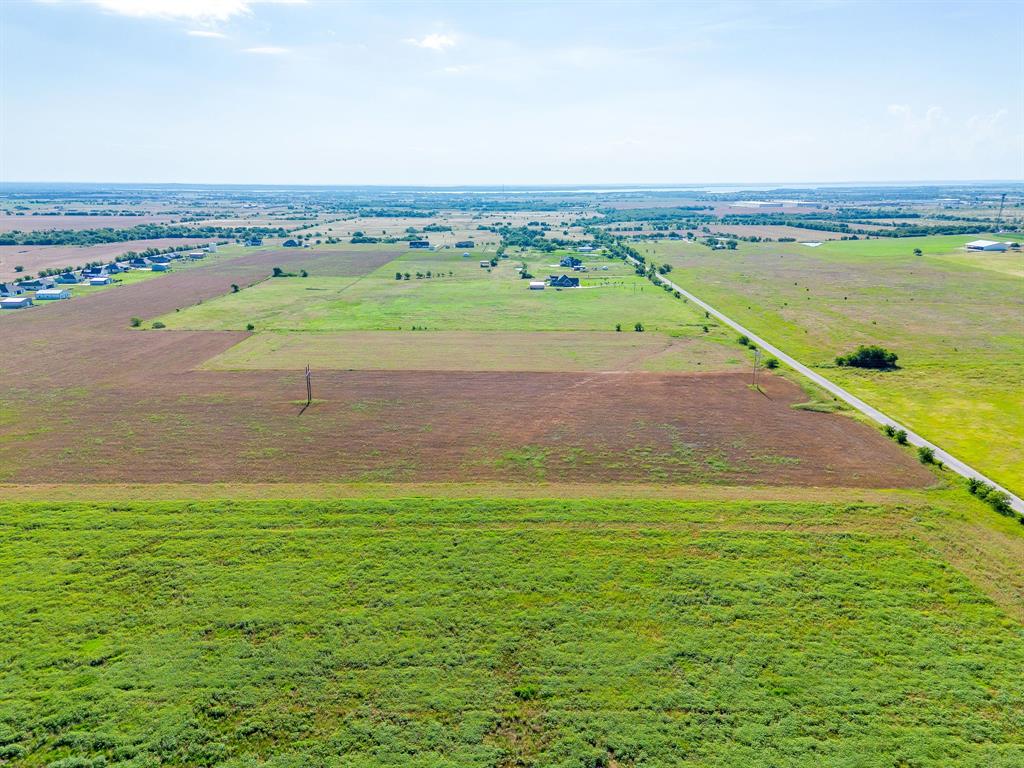 6785 Hoehn Road Valley View, TX 76272 - Photo 8 of 14 Expansive agricultural landscape featuring large tracts of cultivated land and green fields