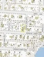 a bathroom with a white wall