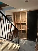 a view of staircase with window