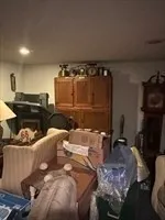 a bed room with a bed and a television