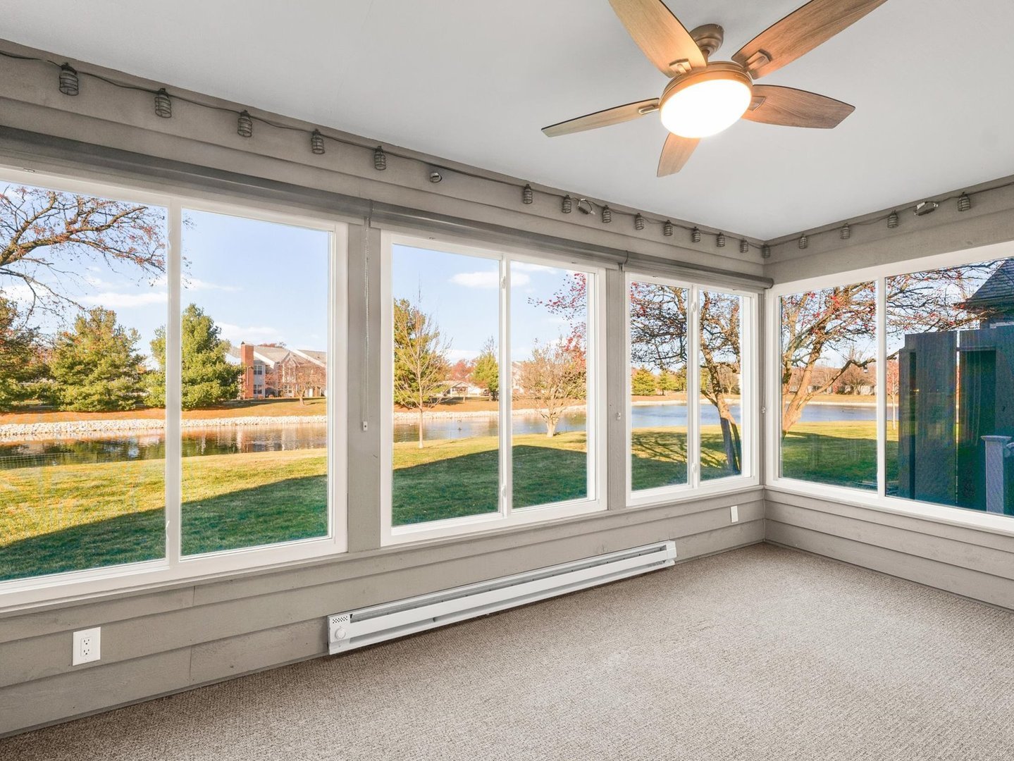 1901 Lakeside Drive, Unit B Champaign, IL 61821 - Photo 12 of 26 a view of room with window and ceiling fan