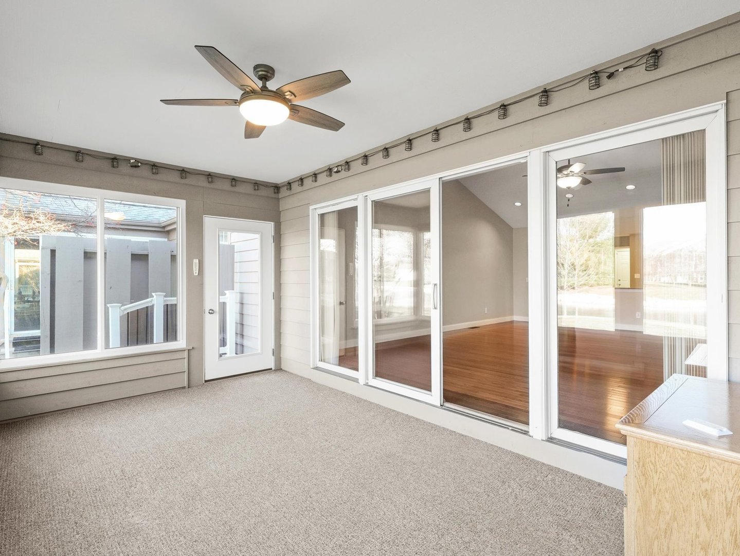 1901 Lakeside Drive, Unit B Champaign, IL 61821 - Photo 13 of 26 a view of an room with a large window and ceiling fan