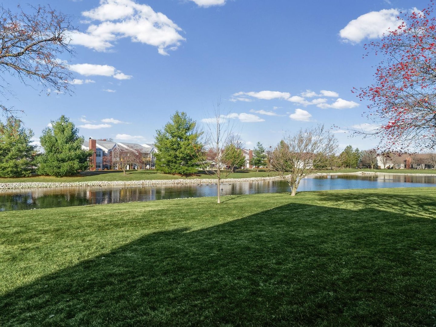 1901 Lakeside Drive, Unit B Champaign, IL 61821 - Photo 24 of 26 a view of a golf course with a lake