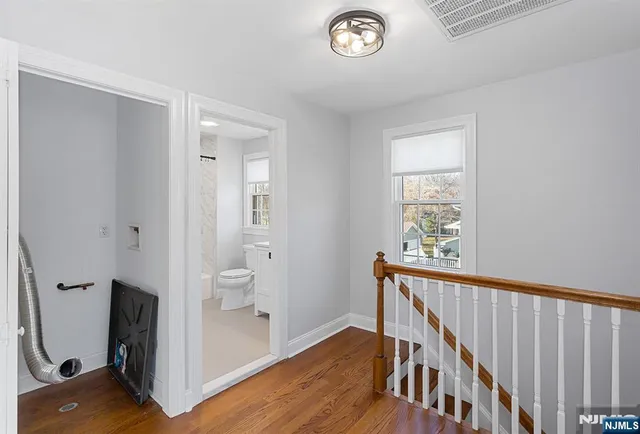 a view of a hallway with workspace