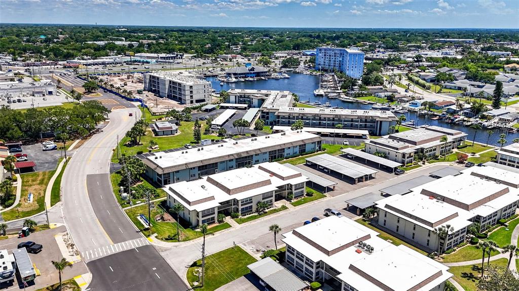 5197 Silent Loop, Unit 124 New Port Richey, FL 34652 - Photo 46 of 55 an aerial view of a swimming pool with outdoor seating
