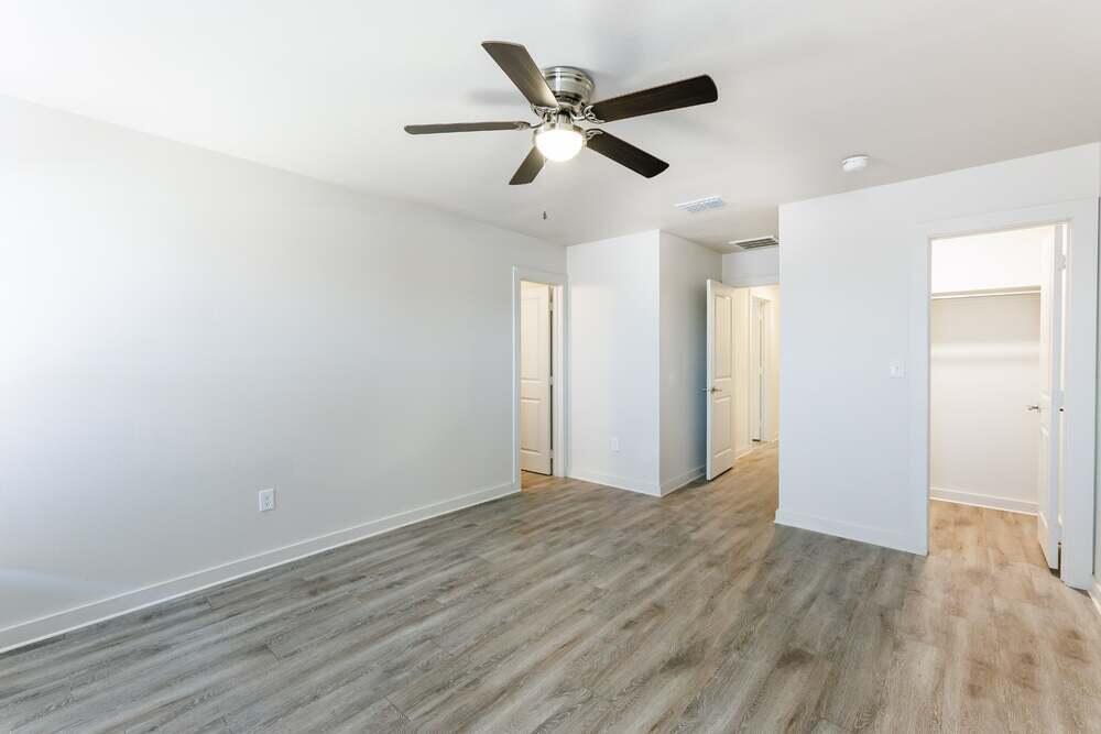 5542 Lehigh Street Lubbock, TX 79416 - Photo 5 of 12 wooden floor in an empty room