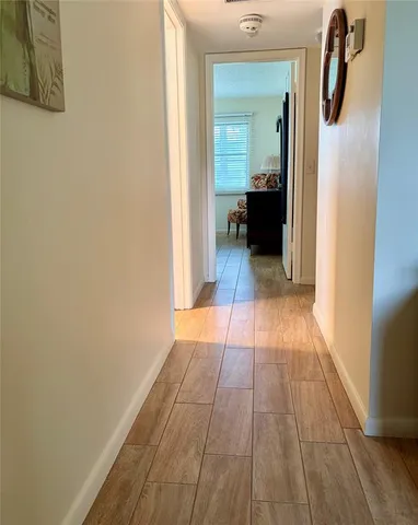 a view of a bedroom from a hallway