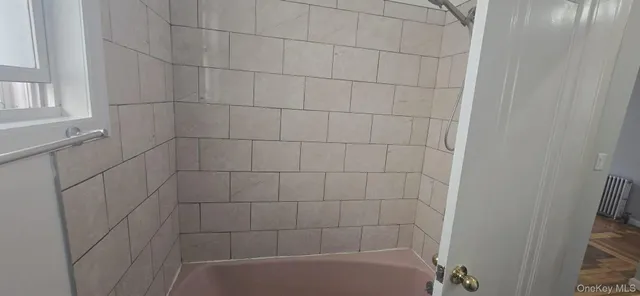 a bathroom with a bathtub