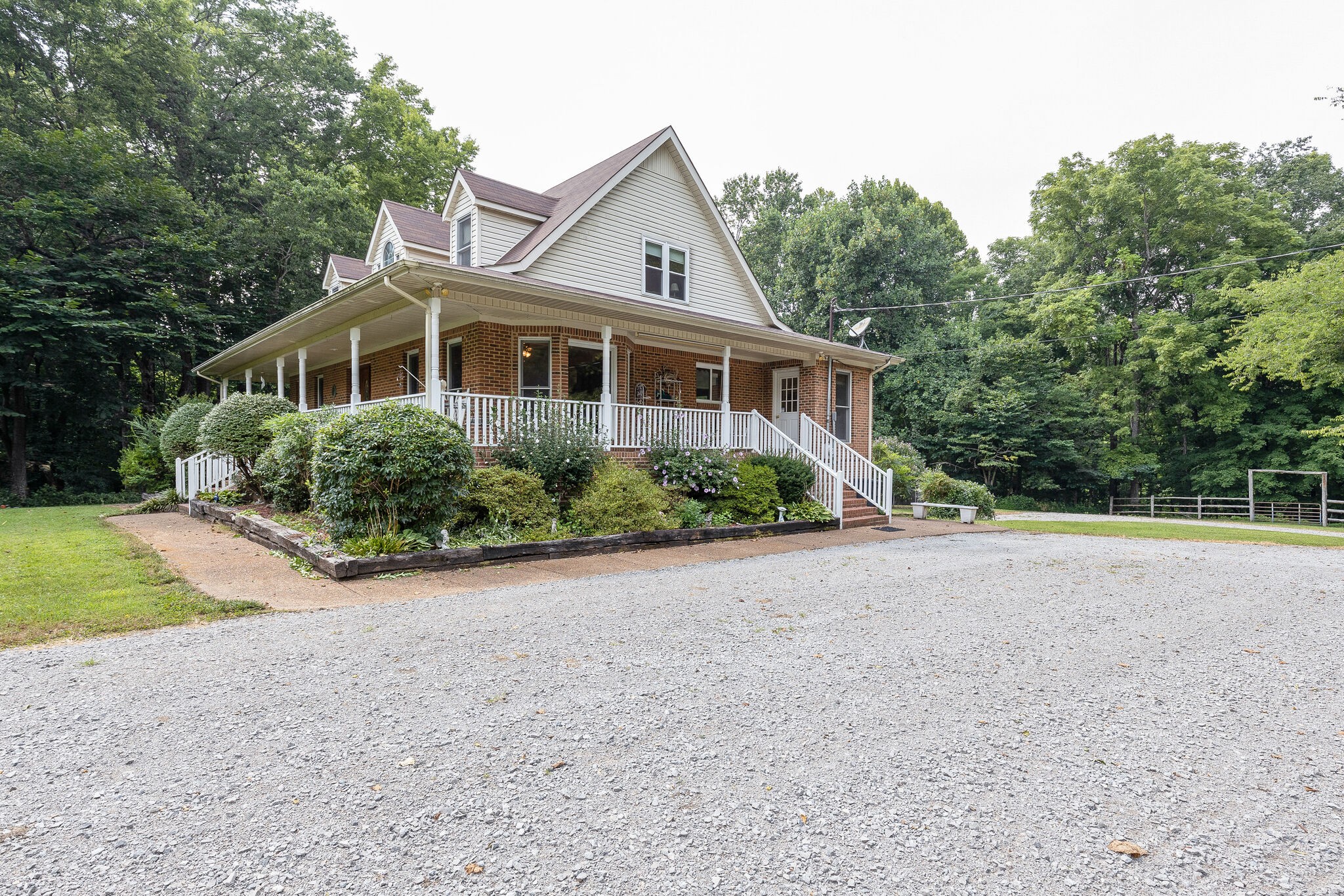 2300 Lee Road Spring Hill, TN 37174 - Photo 2 of 31 a front view of a house with a yard and trees