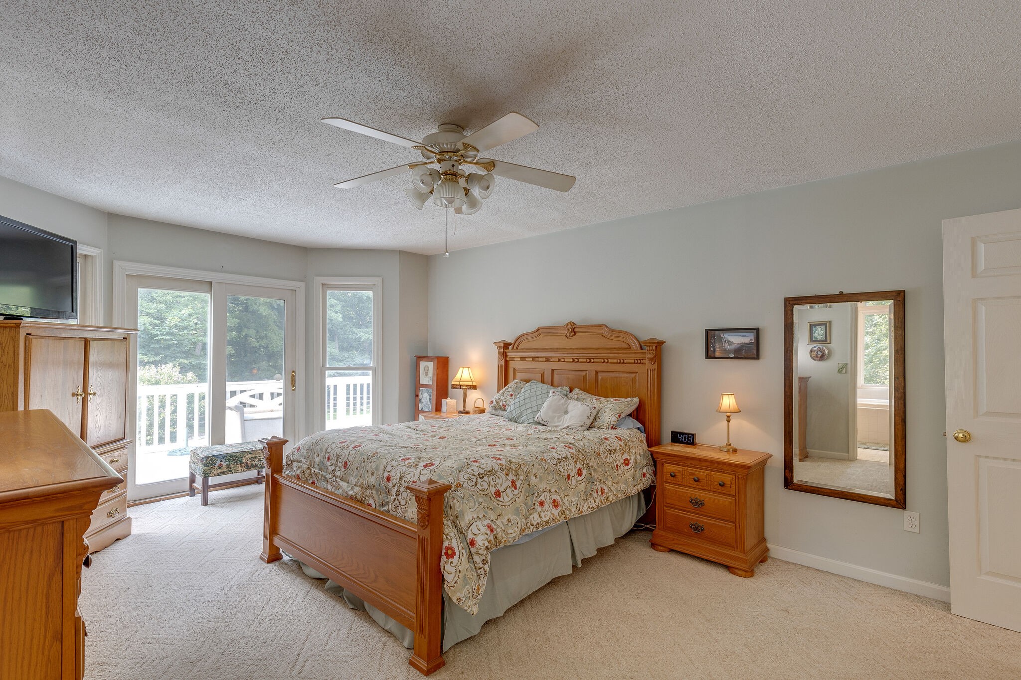 2300 Lee Road Spring Hill, TN 37174 - Photo 16 of 31 a bedroom with a bed and a chandelier