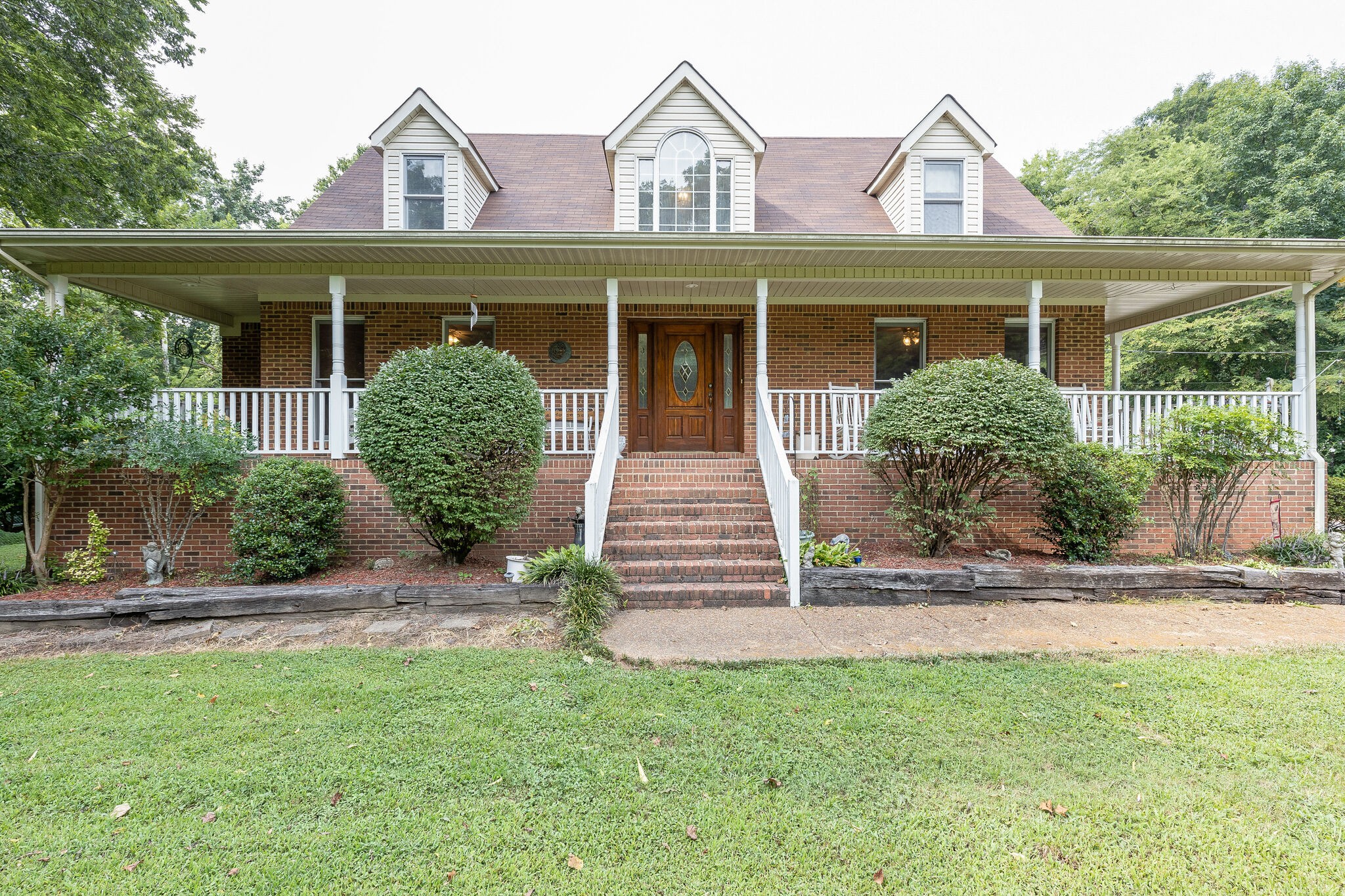 2300 Lee Road Spring Hill, TN 37174 - Photo 3 of 31 front view of a house with a small yard