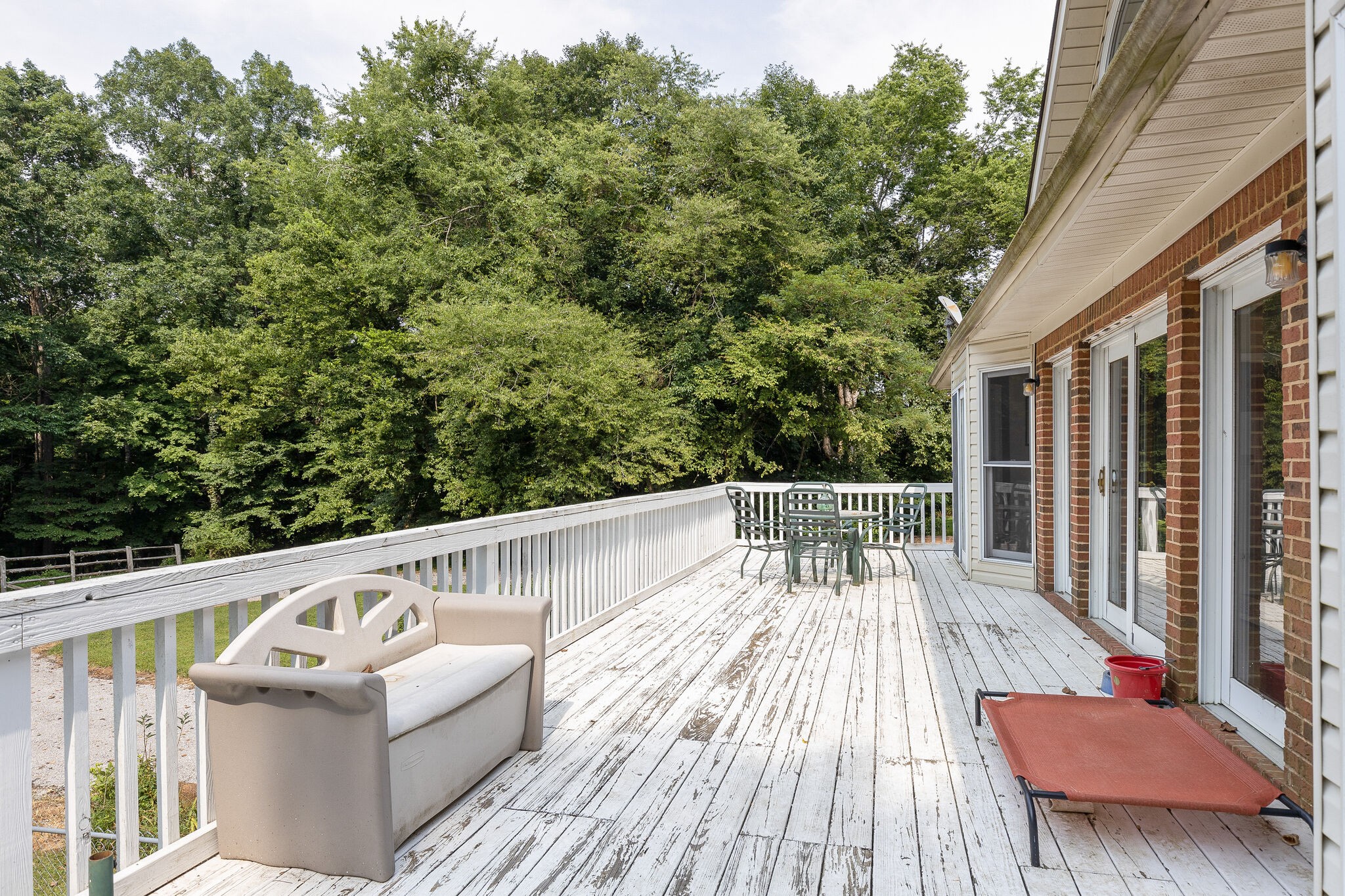 2300 Lee Road Spring Hill, TN 37174 - Photo 22 of 31 a view of a balcony with wooden floor and iron fence