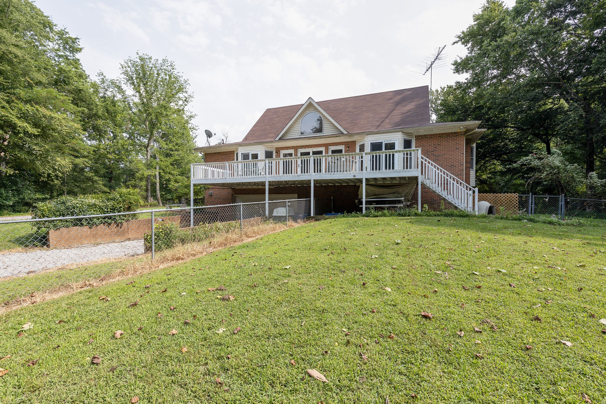 2300 Lee Road Spring Hill, TN 37174 - Photo 24 of 31 a view of a house with a yard and sitting area